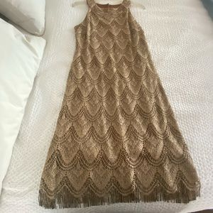 Cute gold island glam dress looks great on and so comfortable.